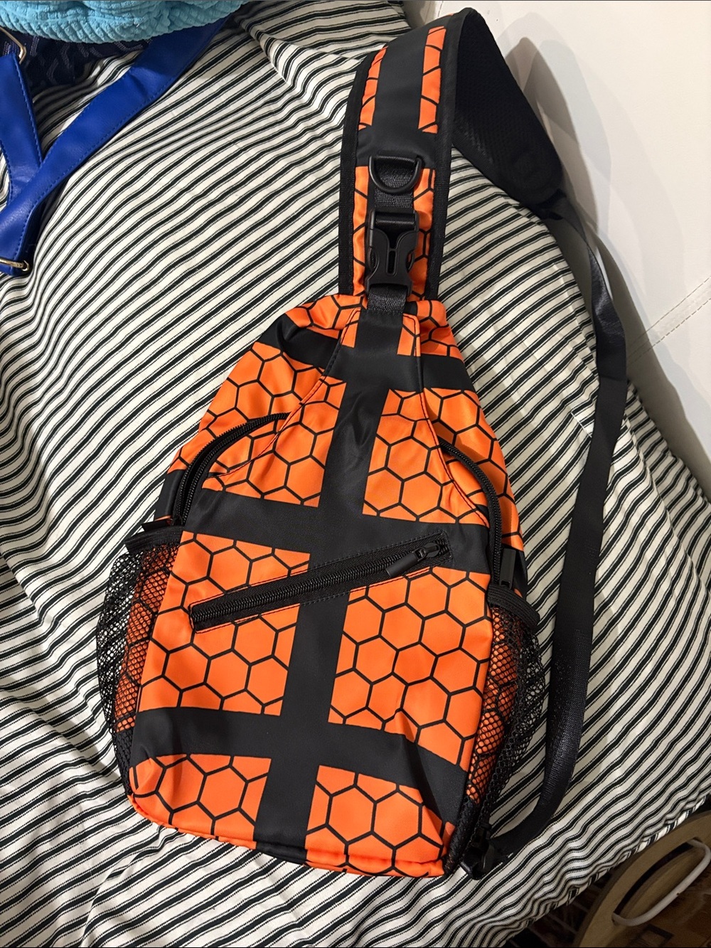 Orange and Black Hex-Pattern Sling Bag